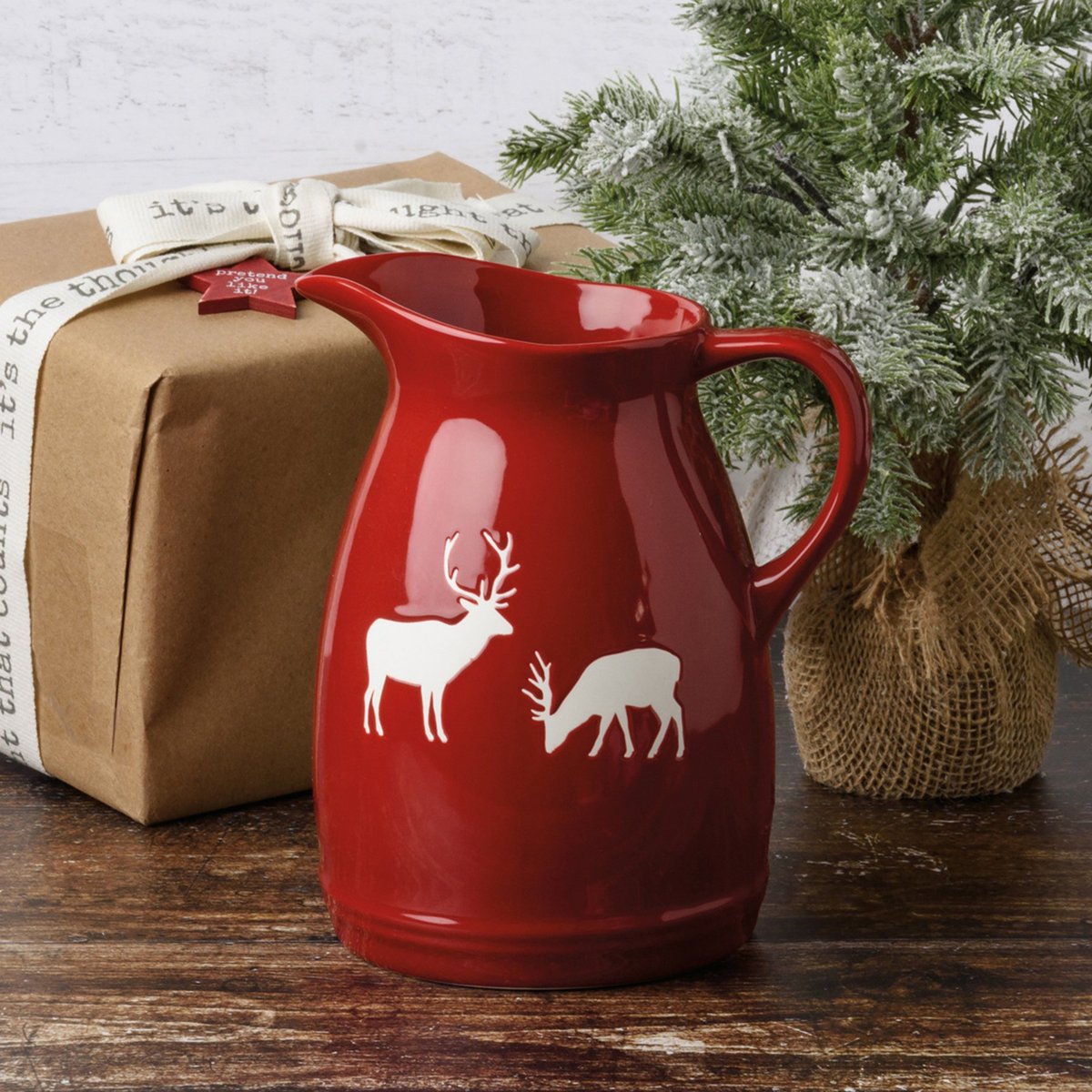 Rustic Red Stoneware Deer Pitcher with Debossed White Buck Design, 6.75-inch