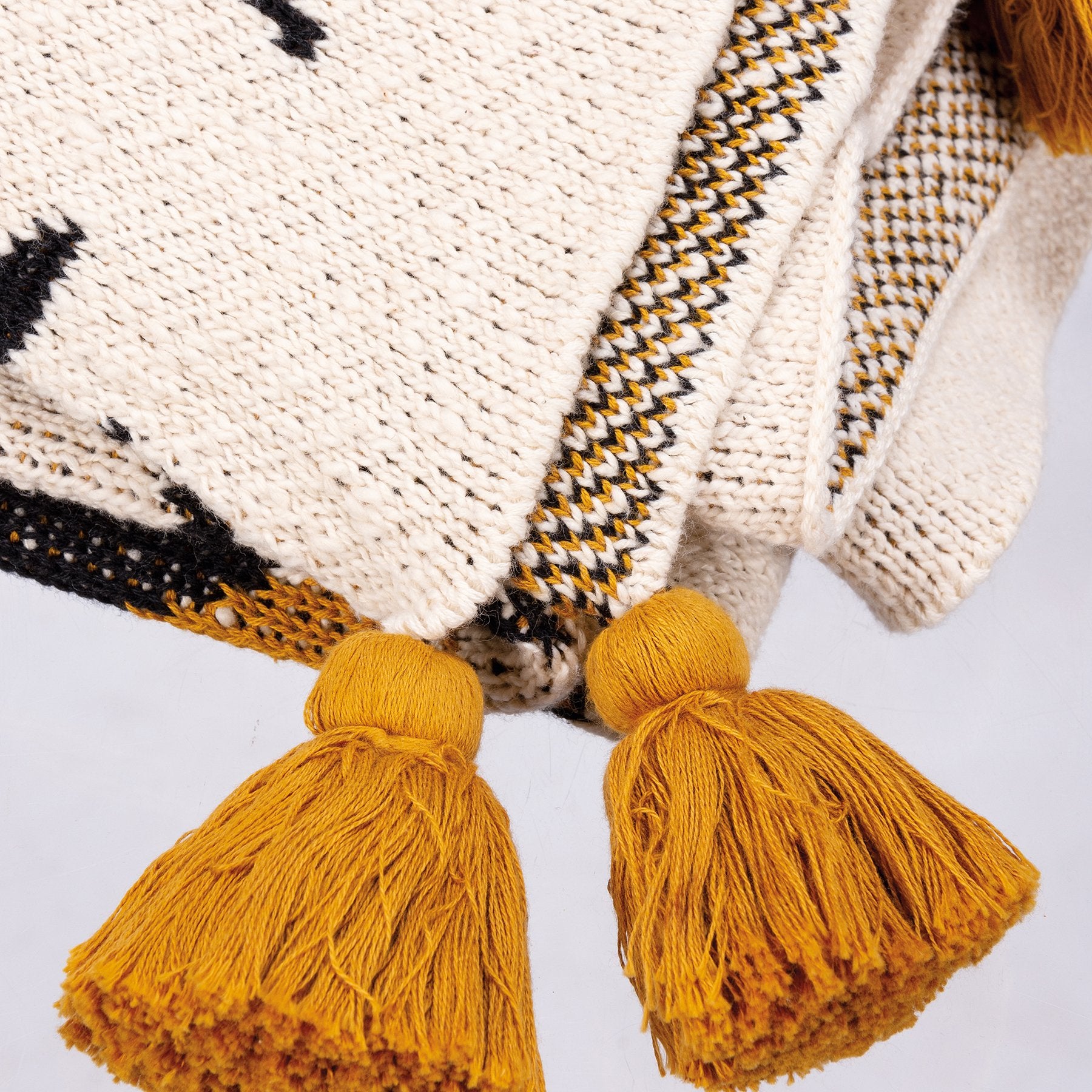 Saffron Black Aztec Knitted Cotton Throw Blanket with Tassels - Artisanal Design