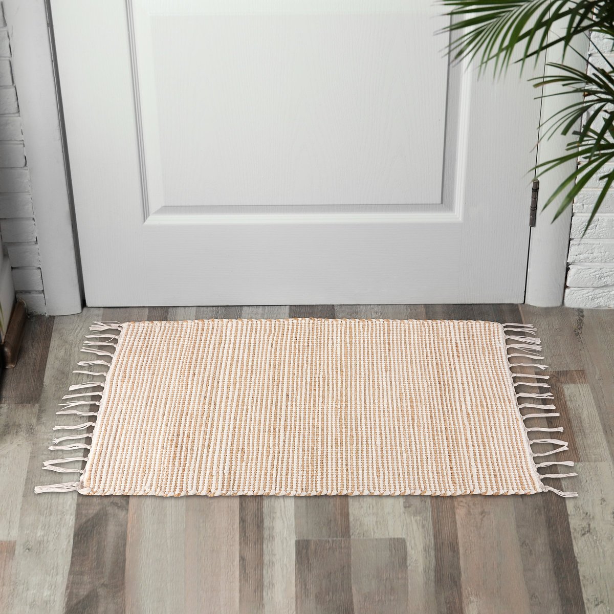 Chic Cream Woven Cotton Rug with Tassels, Perfect for Indoor/Outdoor Decor