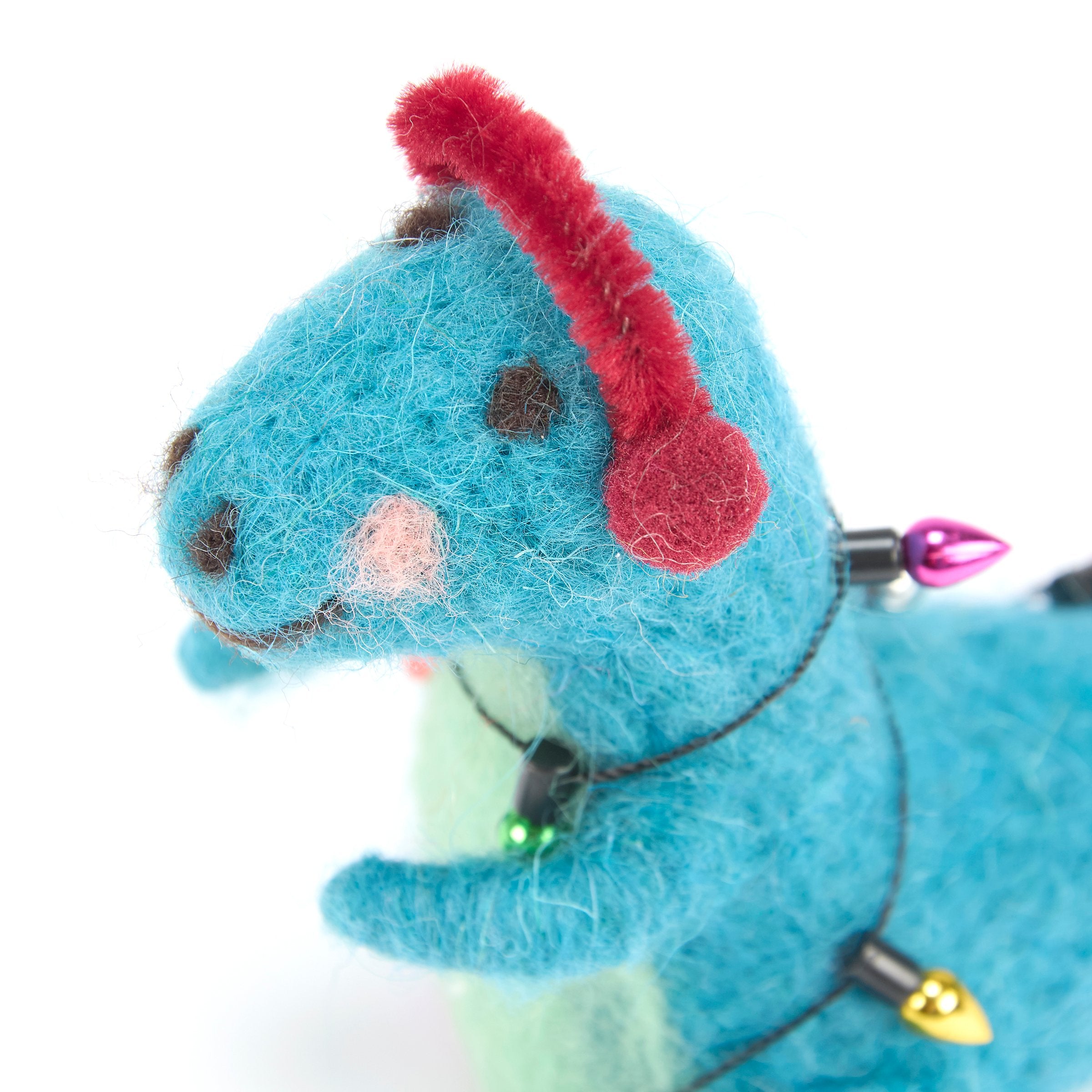 Festive Blue Tyrannosaurus Critter with Ear Muffs and Christmas Lights