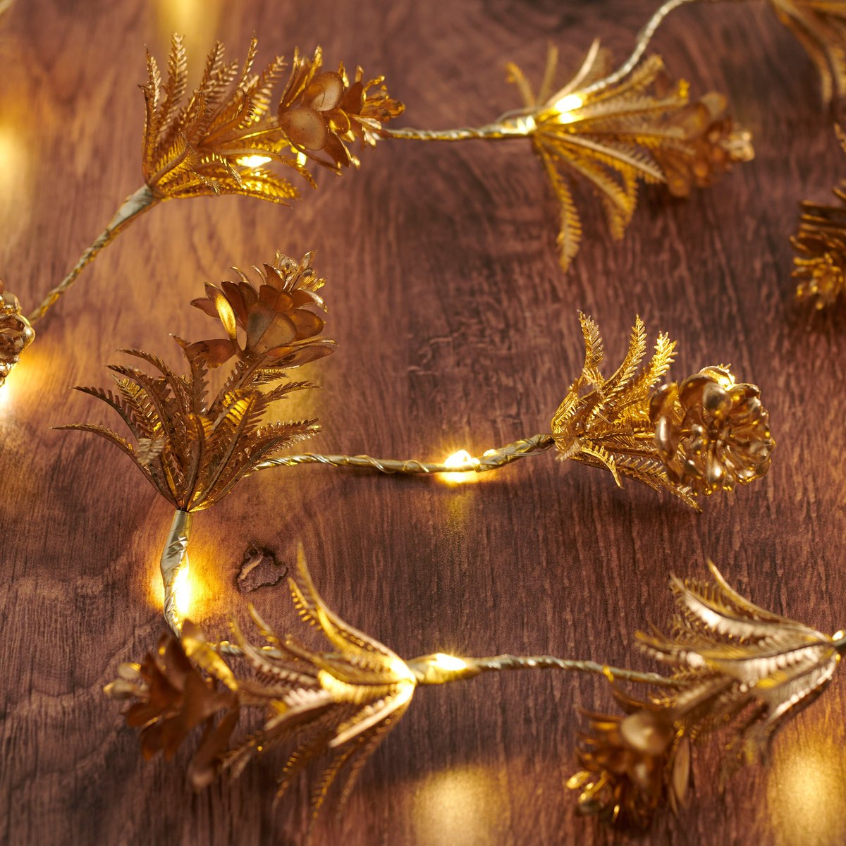 Shimmering Golden Pine Lighted Holiday Garland with 6-Hour Timer, Battery Operated