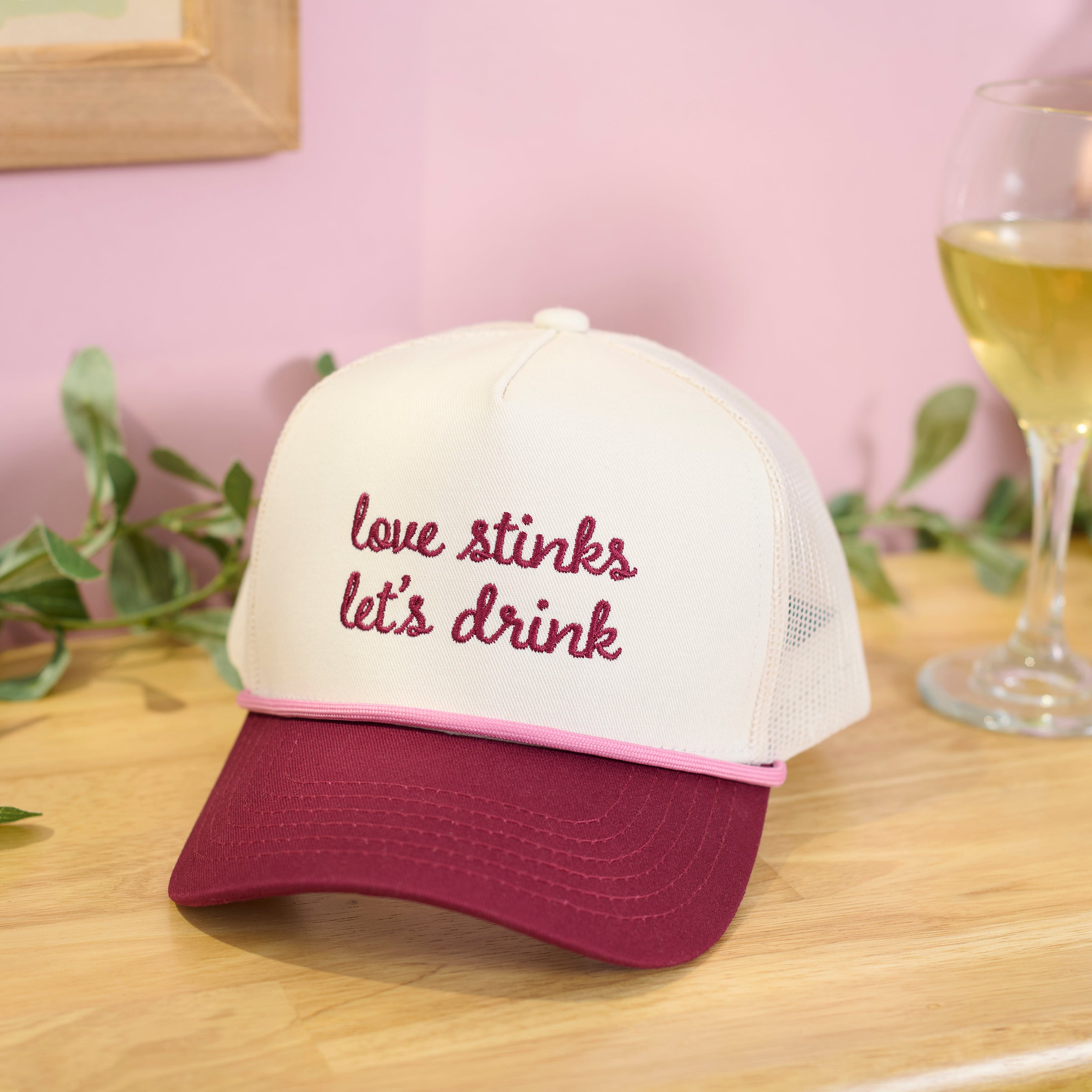 Sassy Anti-Valentine 'Love Stinks Let's Drink' Embroidered Trucker Hat