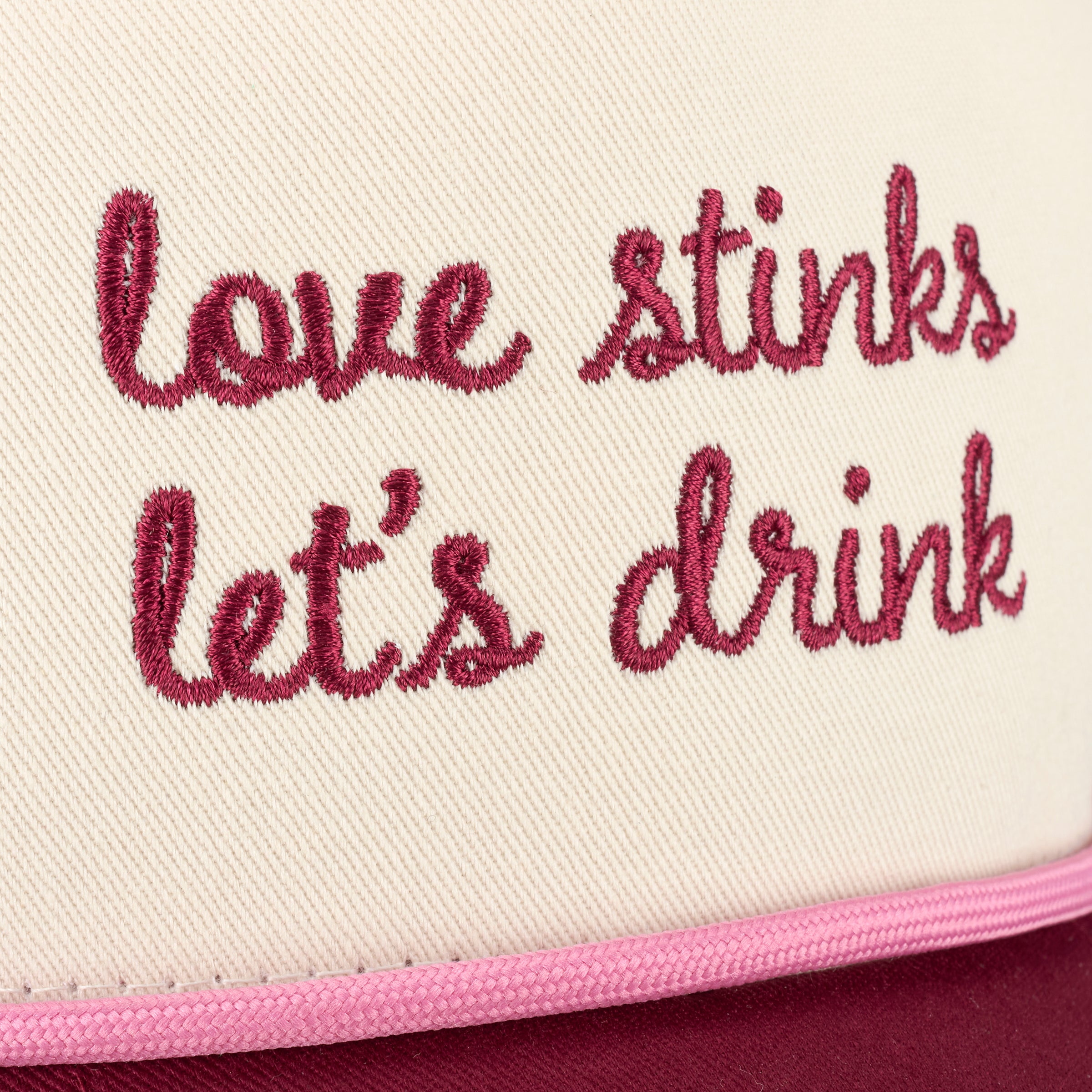 Sassy Anti-Valentine 'Love Stinks Let's Drink' Embroidered Trucker Hat