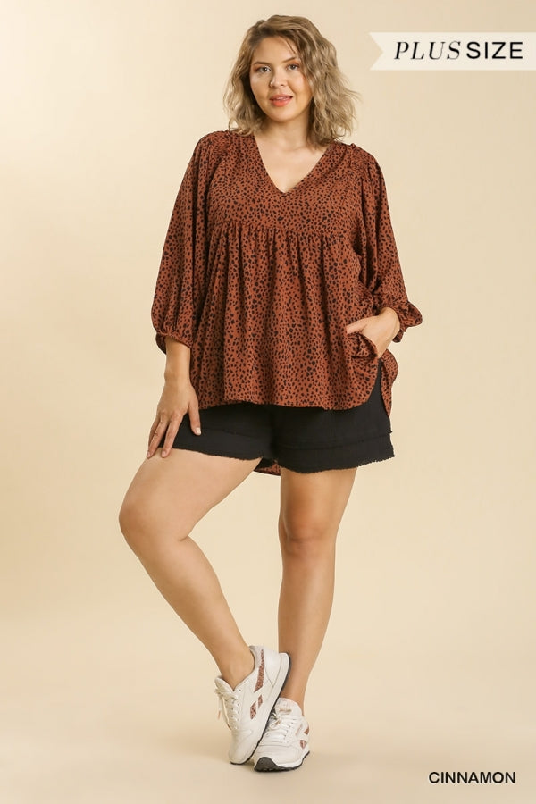 Umgee Animal Print V-Neck 3/4 Sleeve Smocked Detail Babydoll Top with High Low Hem