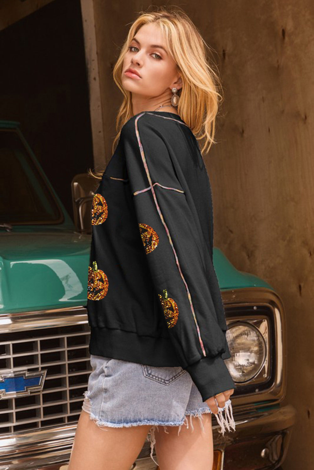 Black Sequin Pumpkin Face Graphic Exposed Seam Halloween Sweatshirt