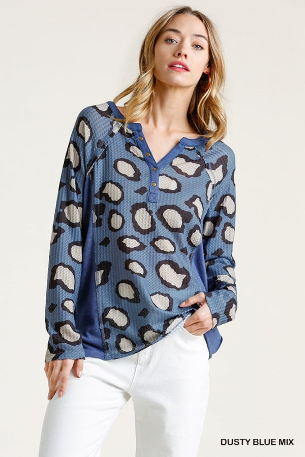 Umgee Animal Print Half Button Front Long Sleeve Waffle Knit Top with Raw Edged Detail